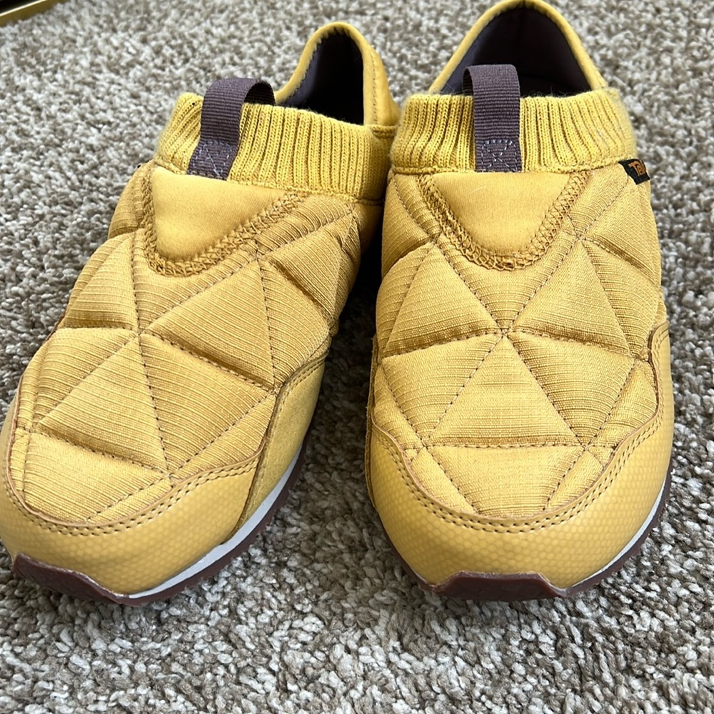 Brand new Teva down slippers